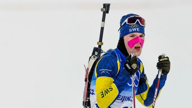 Martin Ponsiluoma Biathlon Champion Focused And Ready Wallpaper