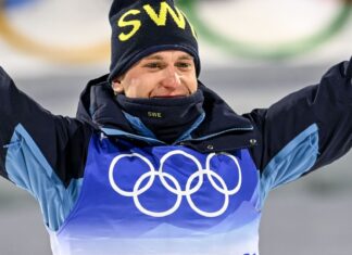 Martin Ponsiluoma Celebrating In Olympic Gear Wallpaper