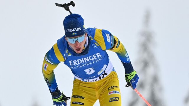Martin Ponsiluoma Competing In Biathlon Ski Race Wallpaper
