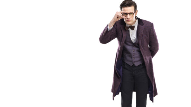 Matt Smith is posing with a thoughtful expression wearing his signature bow tie and long coat, 2K Desktop Wallpaper