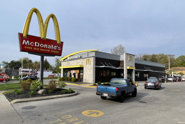 McDonalds Restaurant Exterior with Drive Thru and Iconic Golden Arches Signage