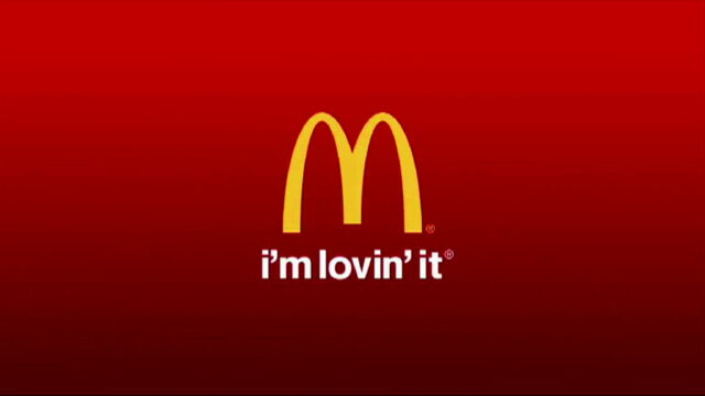 McDonalds Wallpapers Minimalist Red Background with Golden Arches and Im Lovin It Slogan