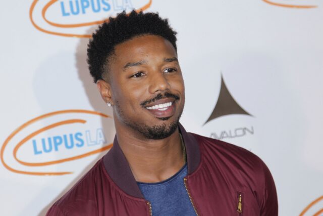 Michael B Jordan Smiling in Casual Jacket at Lupus LA Event Wallpaper