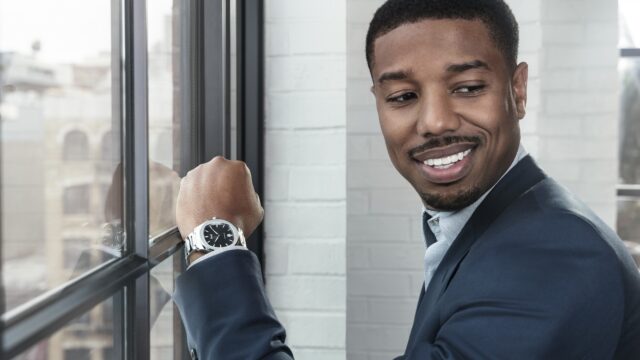 Michael B Jordan Stylish Portrait in Navy Suit Looking Confident by Window for Wallpapers