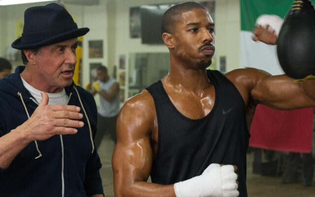 Michael B Jordan Training Scene with Sylvester Stallone Intense Workout Wallpaper