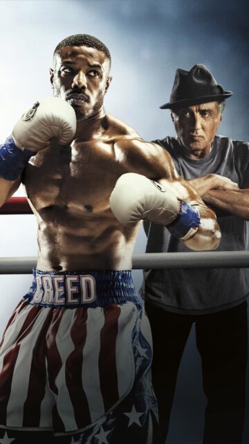 Michael B Jordan as Creed in Boxing Training Scene Wallpaper