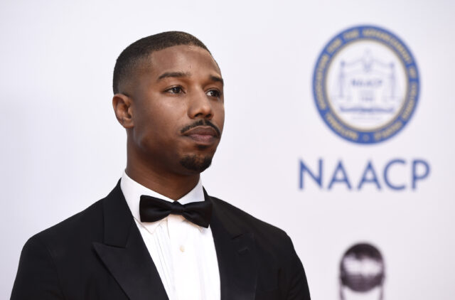 Michael B Jordan in Black Suit at NAACP Event Elegant Wallpaper