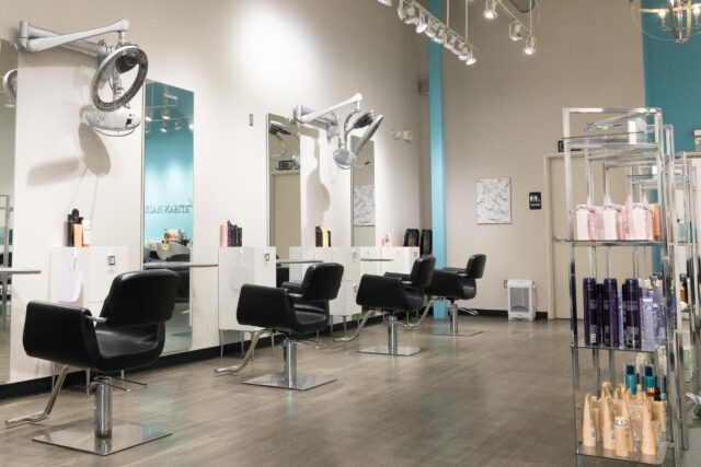 Modern Hair Salon Interior With Styling Chairs And Mirrors