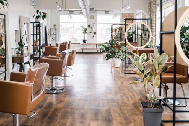 Modern Hair Salon Interior With Stylish Decor And Plants