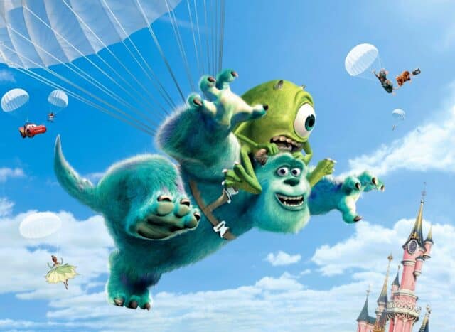 Monsters Inc Wallpaper Featuring Sulley and Mike Skydiving Over a Castle