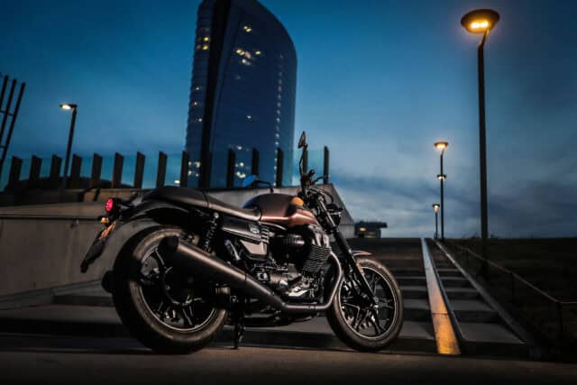 Moto Guzzi V7 Classic Motorcycle Parked at Night Urban Wallpaper Background