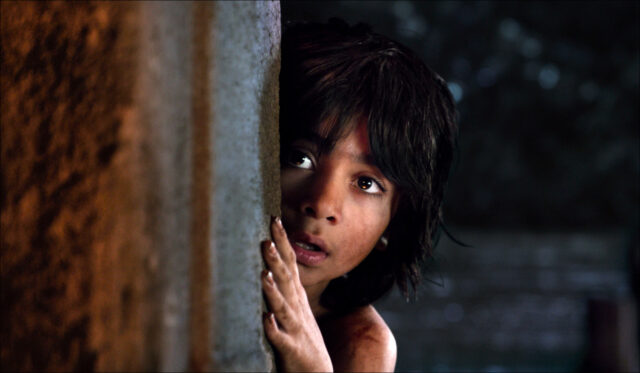 Mowgli Hiding Behind a Wall Scene from The Jungle Book Movie Wallpapers