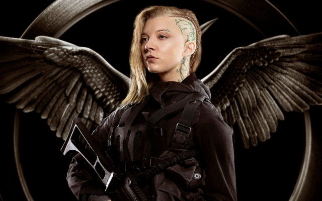 Natalie Dormer With Fantasy Wings, Natalie Dormer Stands Confidently Holding A Rifle With Artistic Wing Designs Behind Her, 2K Desktop Wallpaper