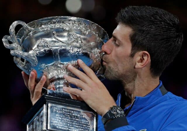 Novak Djokovic Celebrates Victory With Trophy   Wallpaper Background
