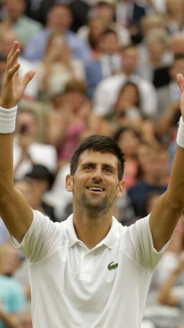 Novak Djokovic Celebrating On Tennis Court Wallpaper