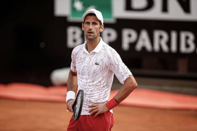 Novak Djokovic Tennis Court Focus Wallpaper