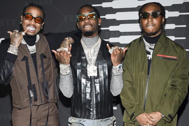 Offset Rapper Style Group Wearing Sunglasses and Chains Urban Fashion Wallpaper