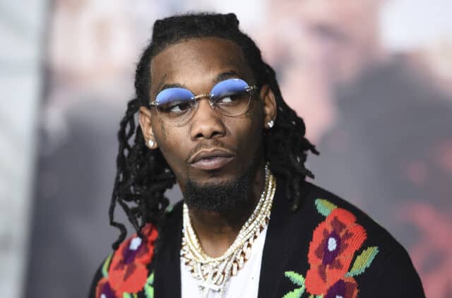 Offset Rapper Stylish Portrait with Blue Glasses and Floral Sweater Wallpaper