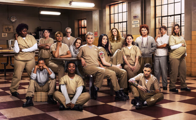 Orange Is the New Black Cast in Prison Cafeteria Setting Wallpaper