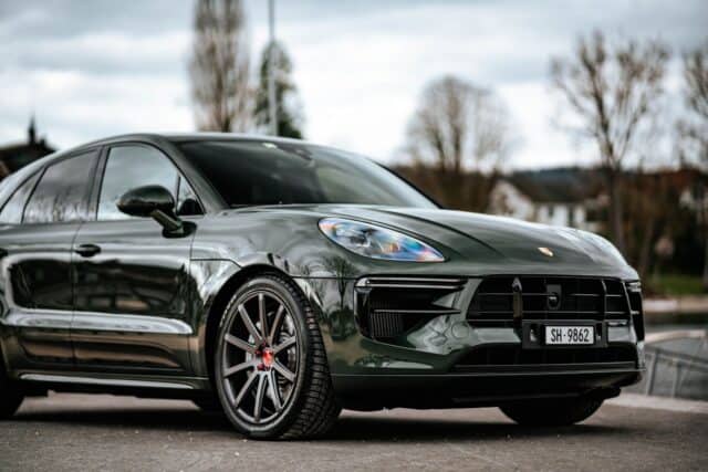 Porsche Macan in Dark Green Stunning SUV Wallpaper for Car Enthusiasts