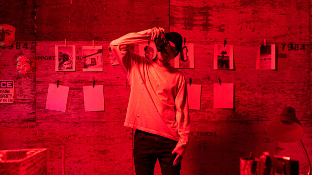 Rauw Alejandro Photography Style Red Tinted Art Wallpaper