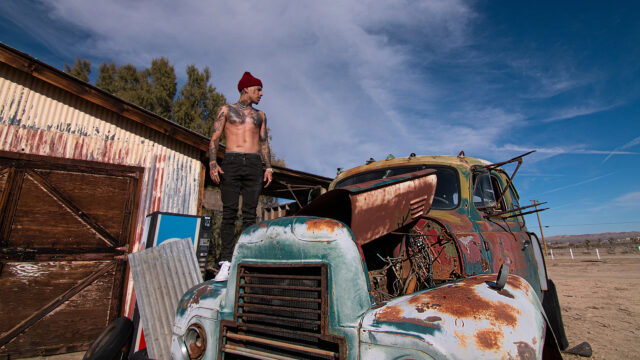 Rauw Alejandro Retro Vibes With Vintage Truck Backdrop