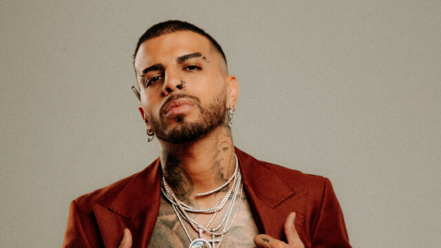 Rauw Alejandro Stylish Portrait Wallpaper For Fans