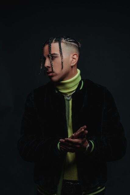 Rauw Alejandro Stylish Pose Wallpaper For Fans