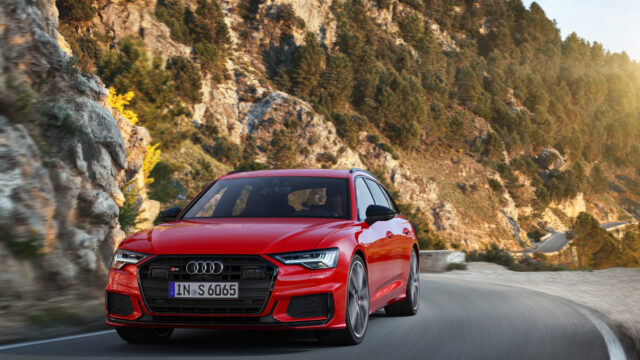Red Audi S6 Driving On Scenic Mountain Road Wallpapers