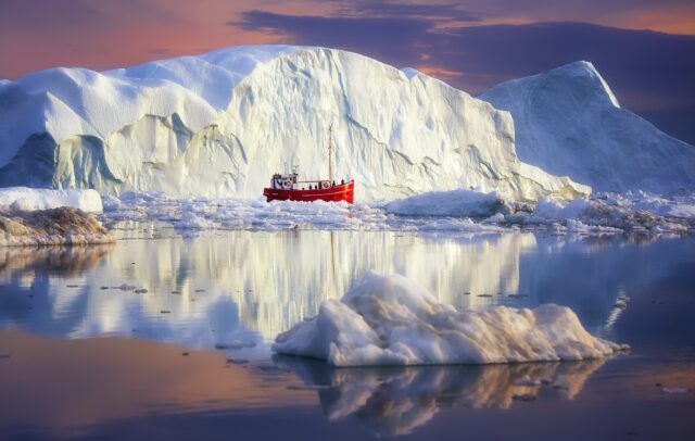 Red Boat Sailing Near Giant Iceberg Reflection Arctic Ocean Wallpapers