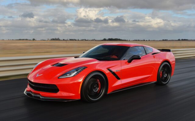 Red Chevrolet Corvette Z06 Speeding On Racing Track Stunning Wallpapers