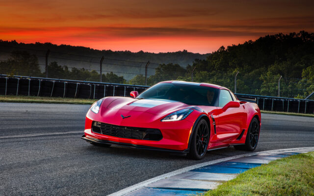 Red Chevrolet Corvette On Race Track At Sunset For Stunning Wallpapers