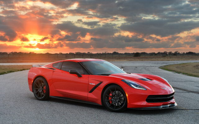 Red Chevrolet Corvette Parked On Road At Sunset Perfect Wallpapers For Car Enthusiasts