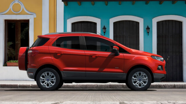 Red Ford EcoSport SUV Side View Urban Background Wallpaper