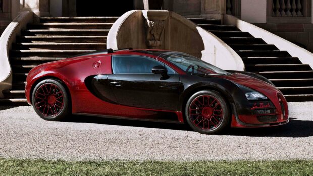 A red and black Bugatti Veyron parked in front of historic stone steps, 4K Desktop Wallpaper