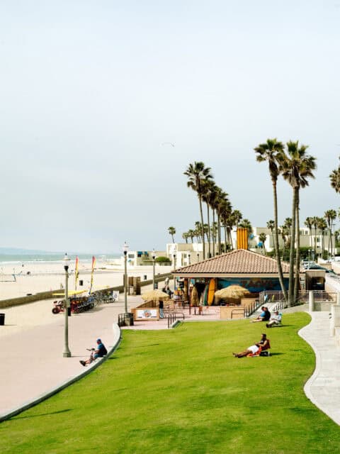 Relaxing Scene at Huntington Beach with Palm Trees and Ocean View Wallpapers