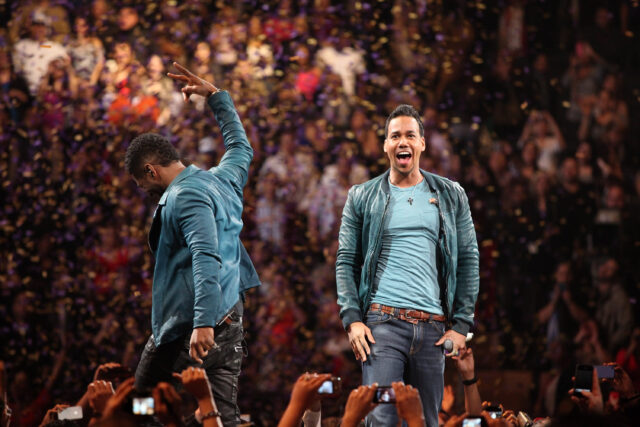 Romeo Santos Live Concert Wallpaper Captures Electrifying Performance