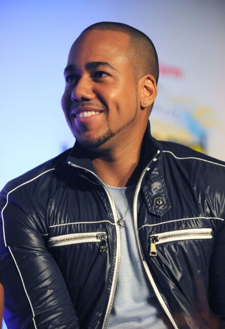 Romeo Santos Smiling in Stylish Jacket for Wallpaper
