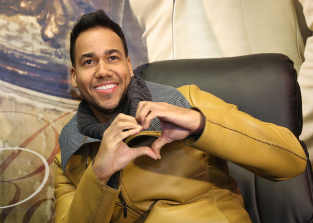 Romeo Santos Smiling in Yellow Jacket for Wallpapers