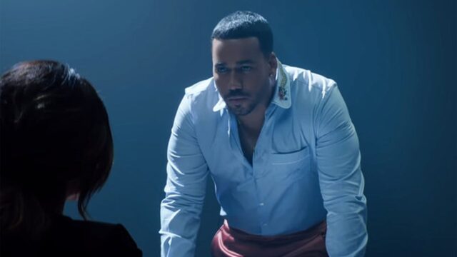 Romeo Santos in Blue Shirt Intense Portrait Wallpaper
