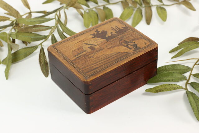 Rustic Wooden Jewelry Box With Leaf Decor Background