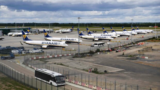 Several Ryanair planes are parked at the airport tarmac, 4K Desktop Wallpaper