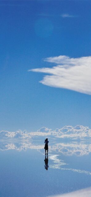 Salar De Uyuni Bolivia Mirror Effect Landscape with Photographer and Blue Sky Wallpaper