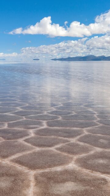 Salar De Uyuni Bolivia Stunning Salt Flats Under Blue Sky Wallpaper