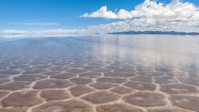 Salar De Uyuni Bolivia Stunning Salt Flats with Reflective Water and Clear Blue Sky Wallpapers