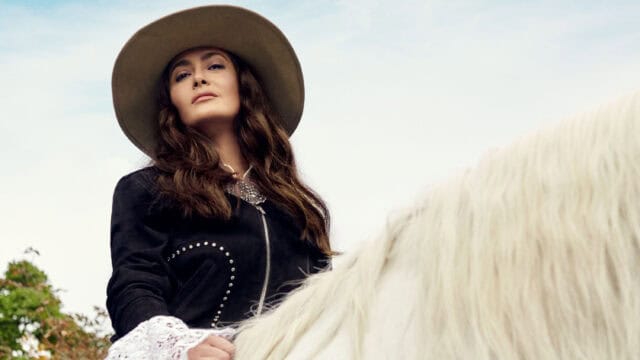 Salma Hayek Riding White Horse in Stylish Western Outfit Wallpaper