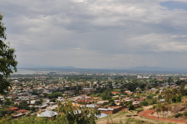 Scenic Cityscape View Of Burundi's Landscape Under Cloudy Skies
