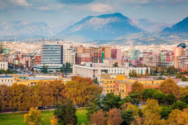 Scenic View Of Tirana Albania With Stunning Mountain Backdrop