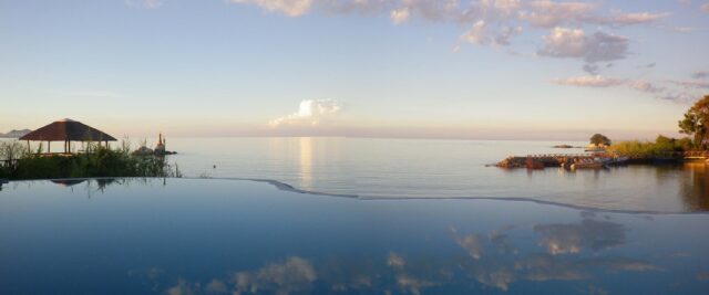 Serene Sunrise Over Lake Malawi Tranquil Wallpaper Scene