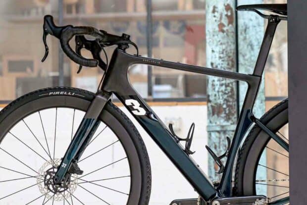 A close up view of a sleek 3T bike showing its frame and front wheel details, HD Desktop Wallpaper